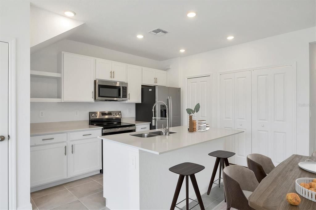 Quartz countertop, and matching stainless appliances!