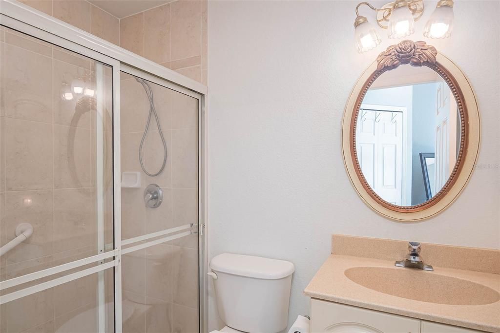 Cottage's main suite bathroom with shower