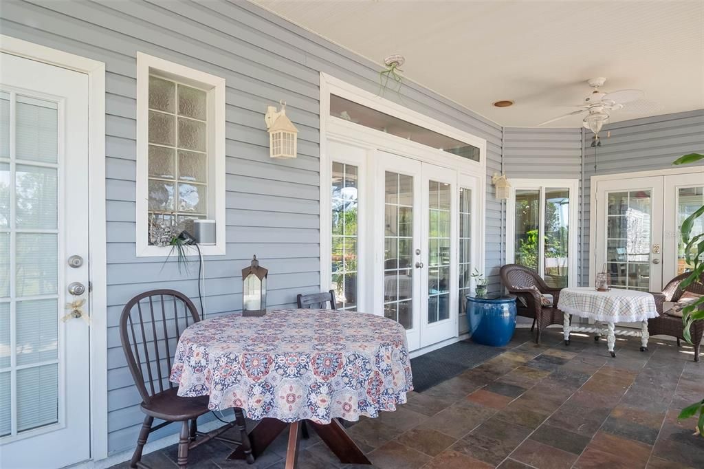 area just outside the pool bath.  Notice the glass blocks and the beautiful French doors