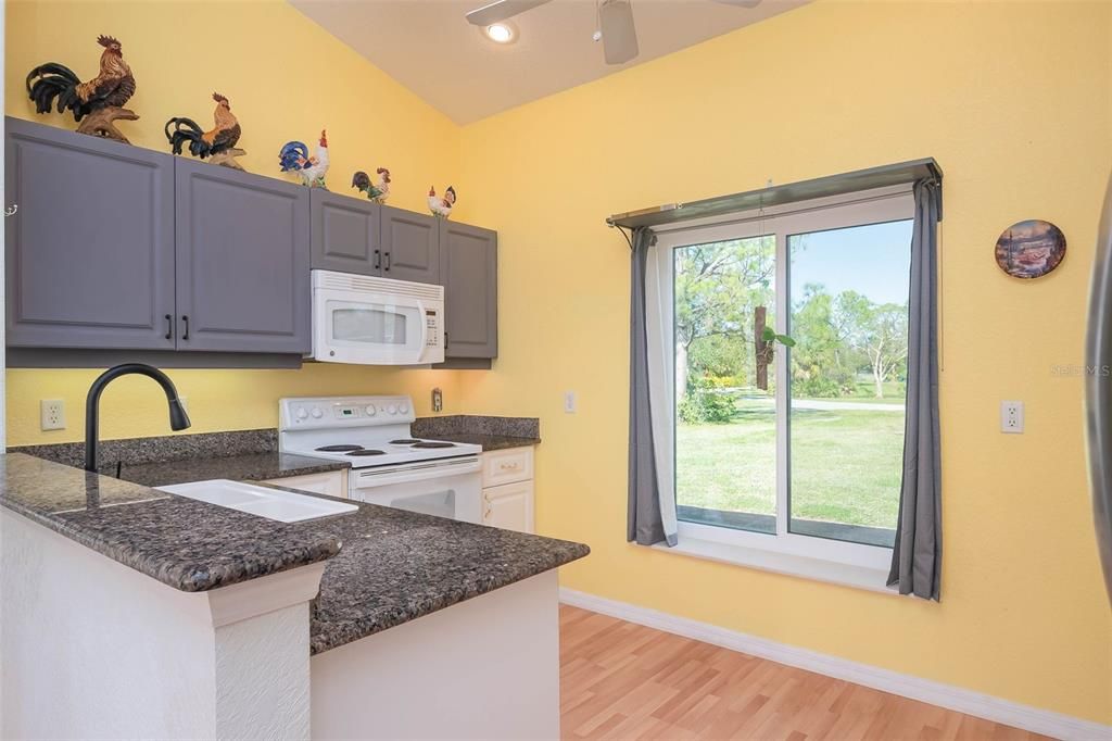 Guest Cottage's full-sized kitchen with bar.