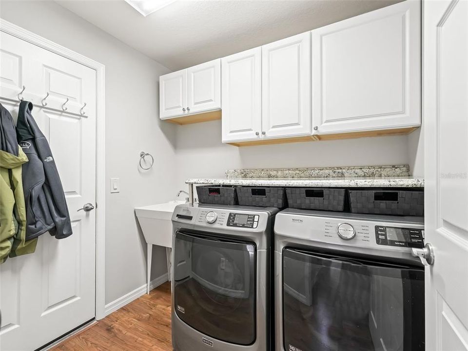 Laundry with Utility Sink and Cabinets