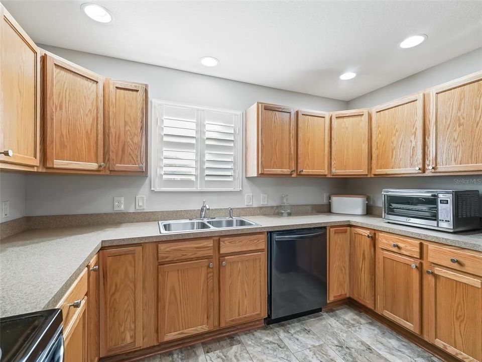 Kitchen - Notice Window Shutters on Windows in Home