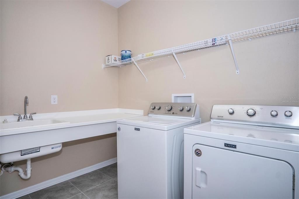 Laundry Room with Sink and Folding Shelf