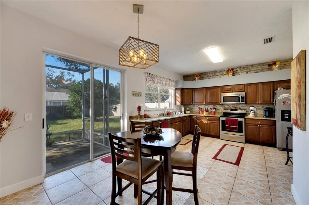 Backyard Entrance Through Sliding Glass Doors in the Kitchen