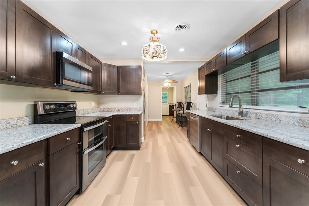 Newly Renovated Spacious Kitchen With Granite Counter Tops