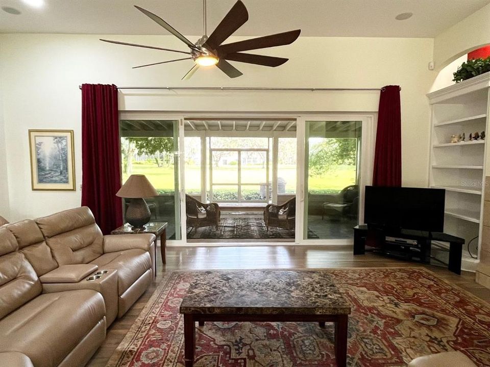 Family Room with new sliders to back porch and views of golf course