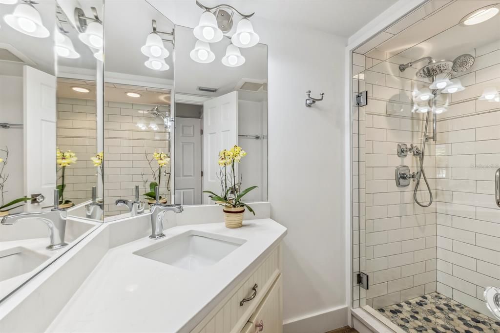 Guest bathroom #1 that doubles as a powder bathroom.