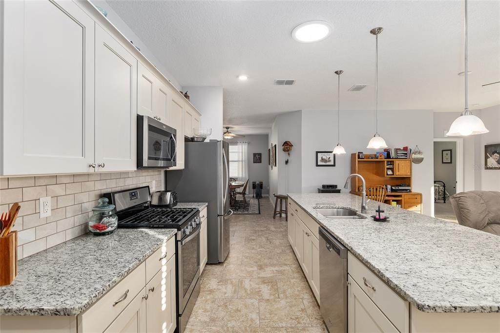 EFFICIENT KITCHEN WORKING SPACE OPEN TO GREAT ROOM