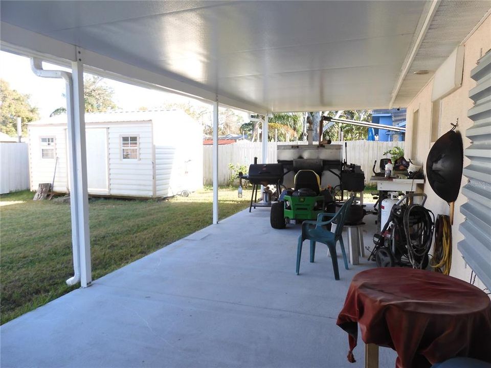 Storage shed/workshop in back yard.