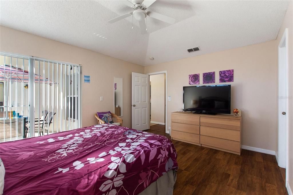 Primary Bedroom with sliding doors to pool