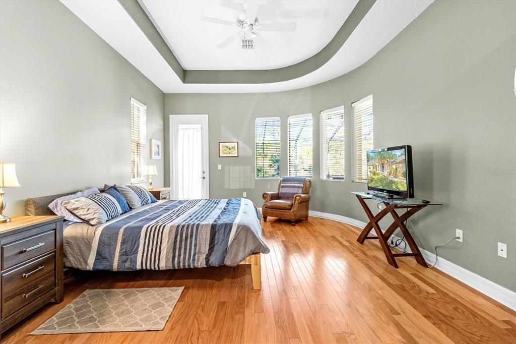 Master Bedroom with french door to the pool/lanai area