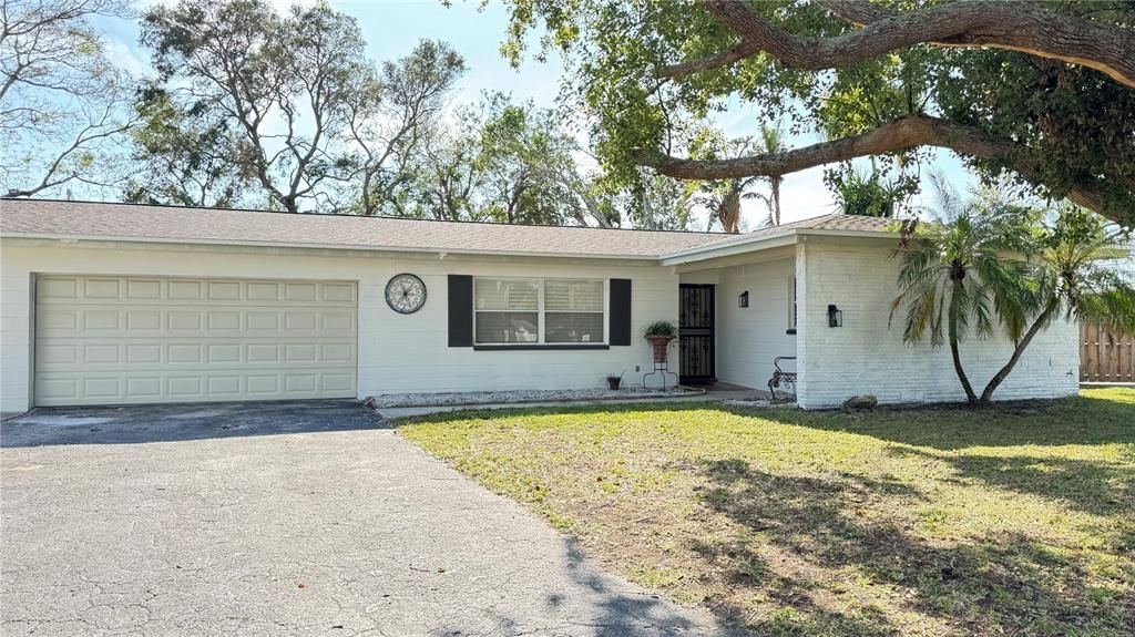 Dreamy one-story home on large fenced lot in Seminole, Florida.