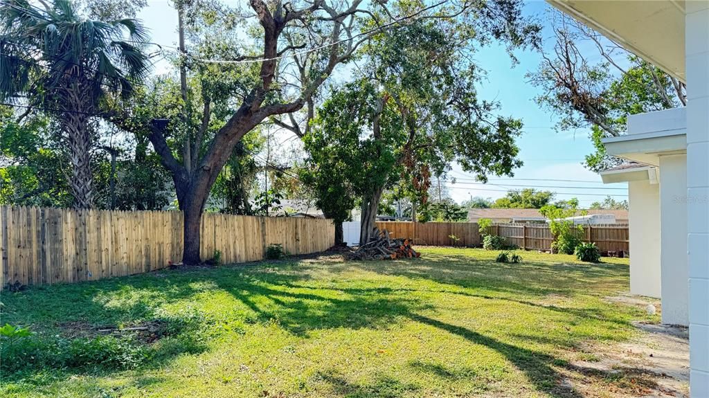 Peaceful backyard on approx. 1/3 acre private, fenced lot.