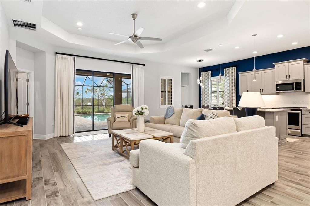 Living room overlooking lanai and pool