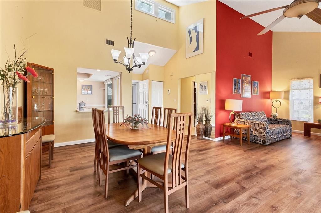 Dining W/ Chandelier & pass-through from kitchen