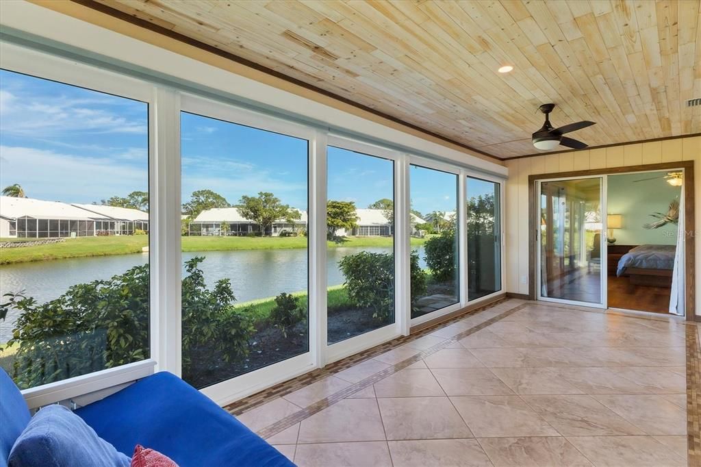 Lanai W/pond view / Hurricane windows/doors & remote-controlled blinds & fan