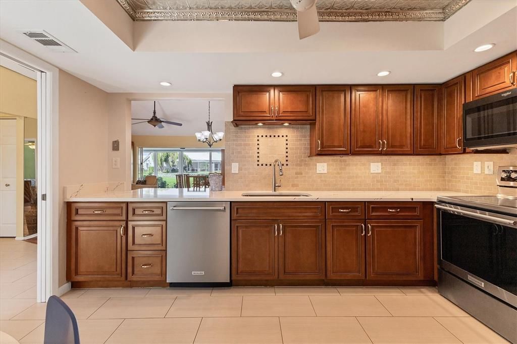 Kitchen W/ convenient pass-through to dining area