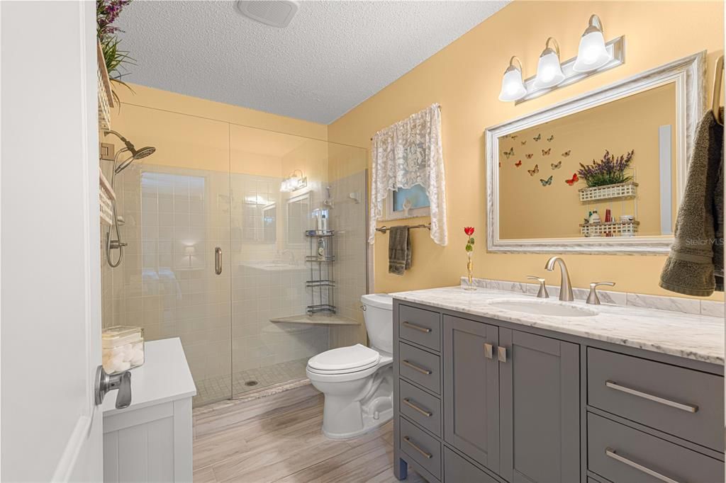 En Suite Bath with Step-In Shower, Glass Surround, UPGRADED Vanity & More!