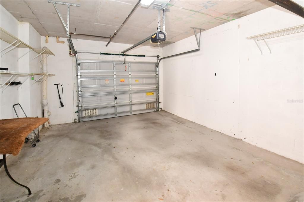 The large, private Garage has plenty of room for a auto plus storage.