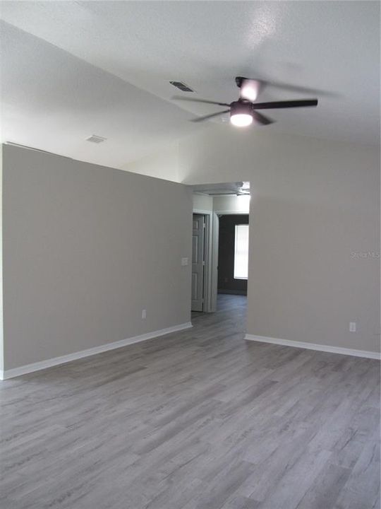 FAMILY ROOM TO 2ND & 3RD BEDROOMS