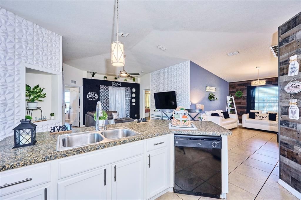 View of family room and dining area from kitchen