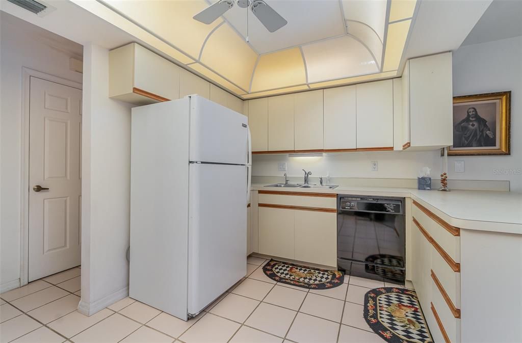 Kitchen with ample counter space and cabinetry.