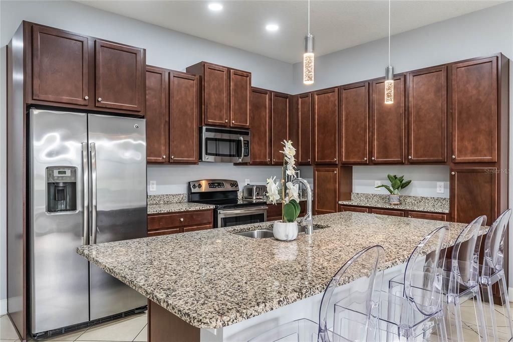 Well updated kitchen with granite, stainless steel appliances and an abundance of storage!