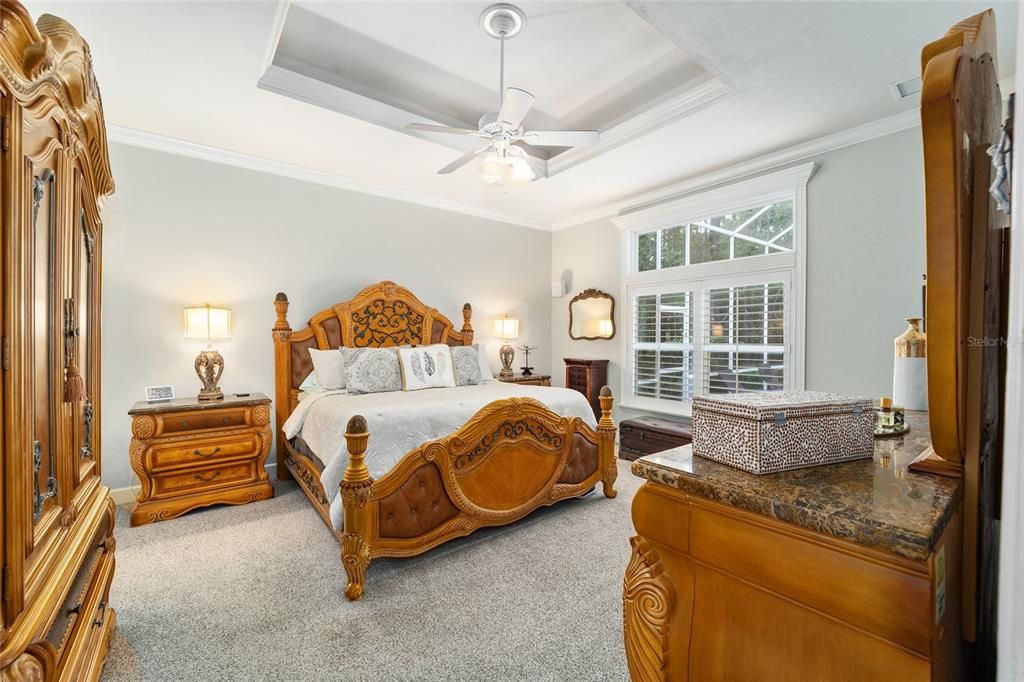 Master Bedroom: Tray ceiling, 2022 carpet, plantation shutters