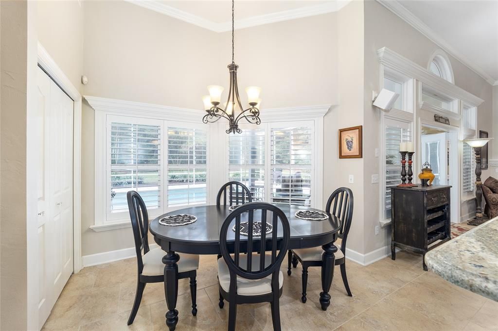 Breakfast nook area overlooking the pool/ Plantation shutters