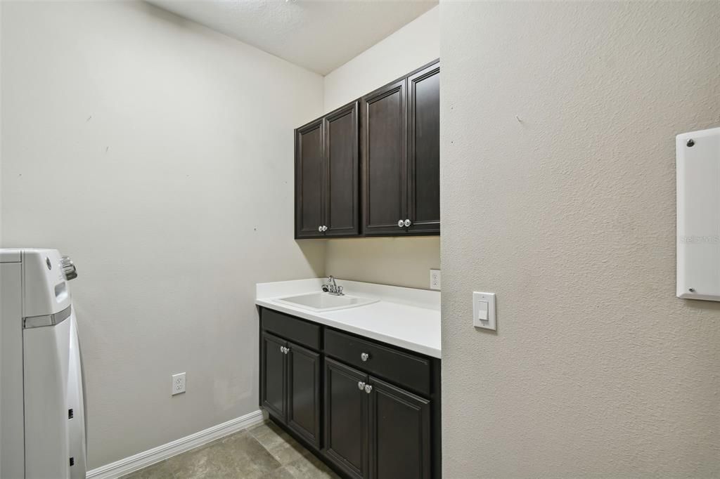 Laundry room cabinets and sink