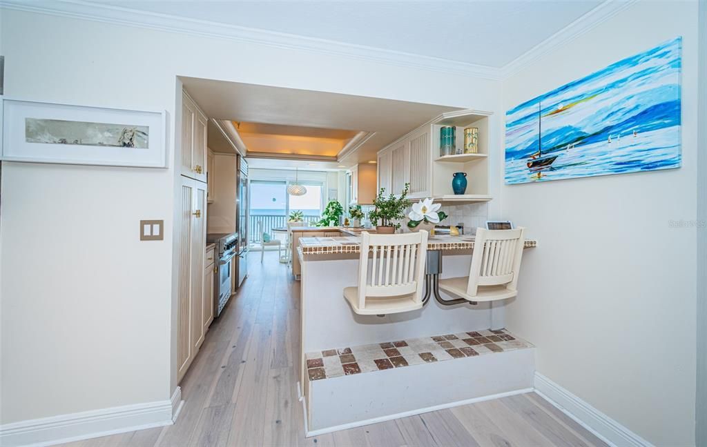 Kitchen with Breakfast Bar and built-in bar stools