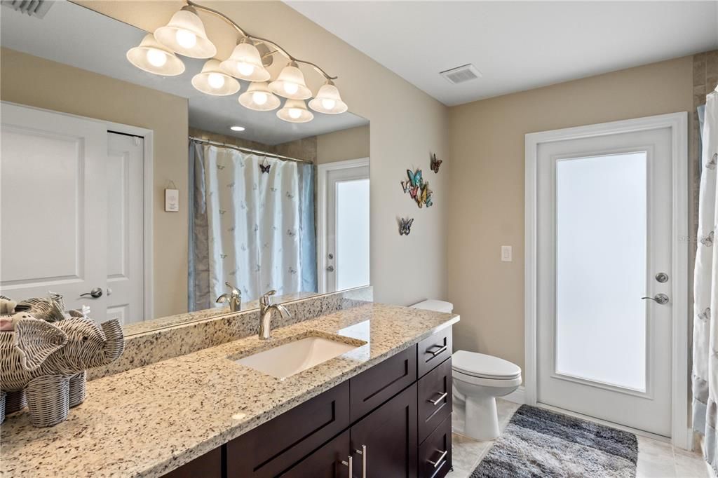 Bathroom with vanity and toilet