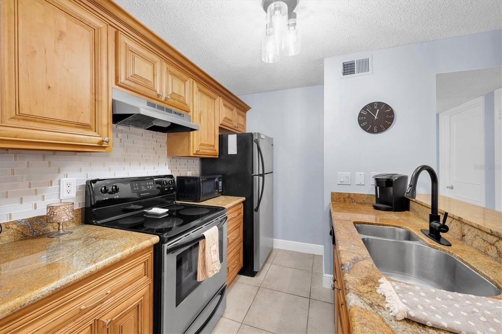 Upgraded cabinets and hardware in kitchen