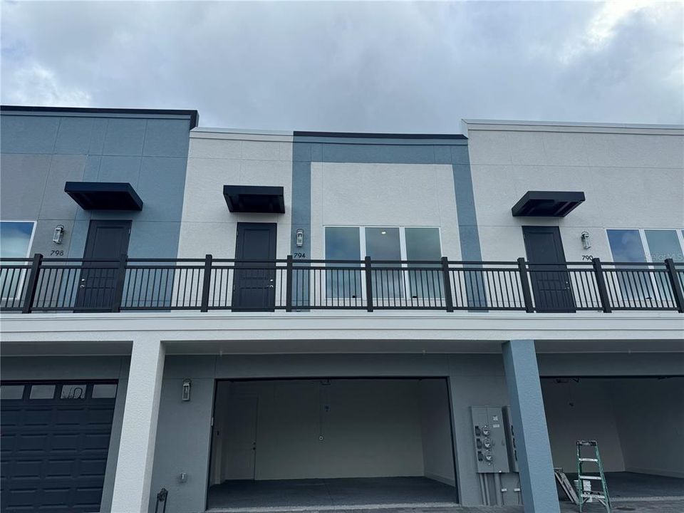 STAIRCASE AT BOTH ENDS OF BUILDING PROVIDE EASE OF ACCESS TO GUEST HOUSE ENTRY