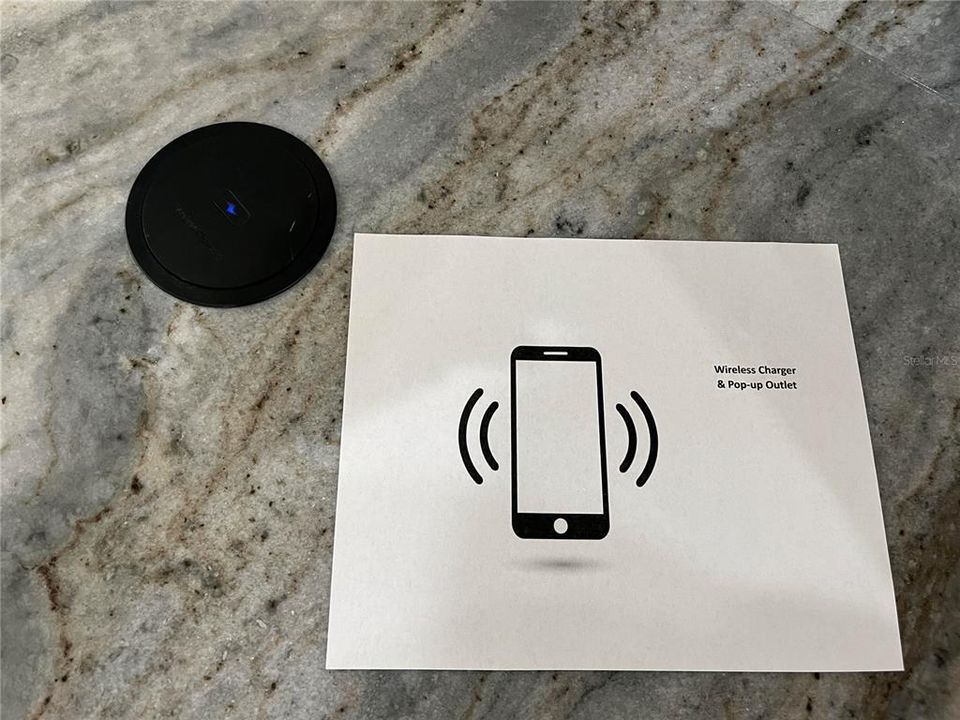 Wireless Charger and Pop-up Outlet