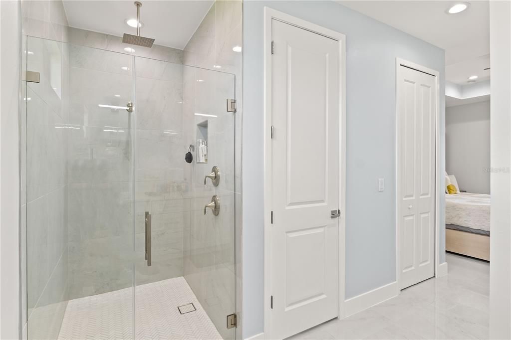 Bathroom featuring a shower with shower door