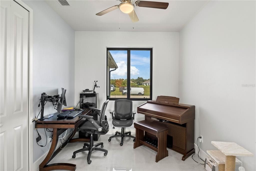 Office area featuring ceiling fan