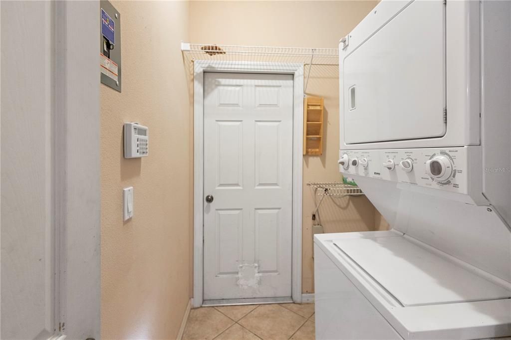 Inside laundry room leading to the garage