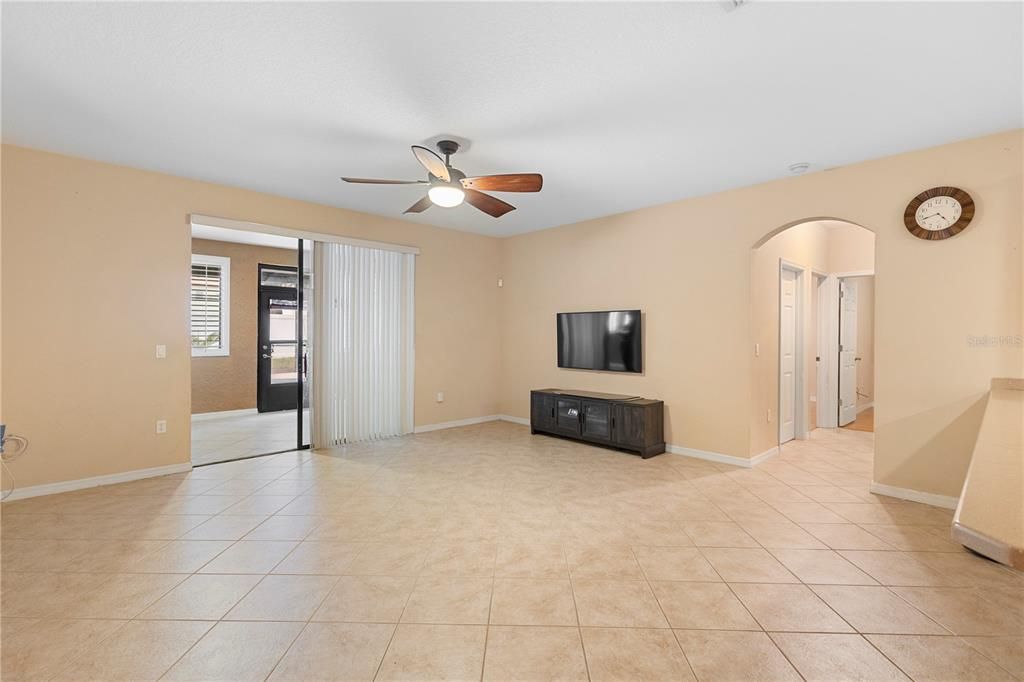 Family room, with guest bedrooms to the right and Florida room to the back, primary bedroom to the left