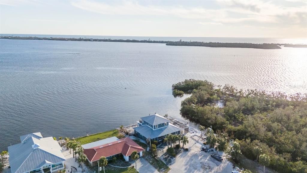 Paradise awaits! See the dolphin playing? The magic of LEMON BAY life will not disappoint! Cul-de-sac house faces the BAY to the South and the PARK to the West. Gorgeous Sunsets.