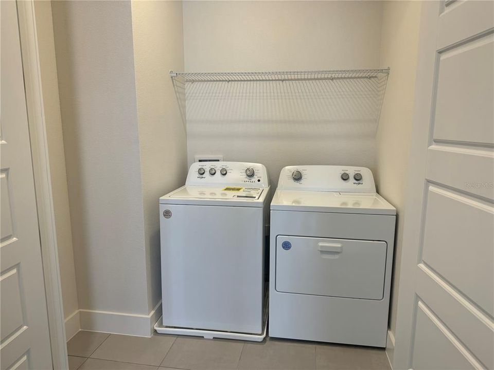 FULL SIZED LAUNDRY w/ CLOTHES HANGING AREA