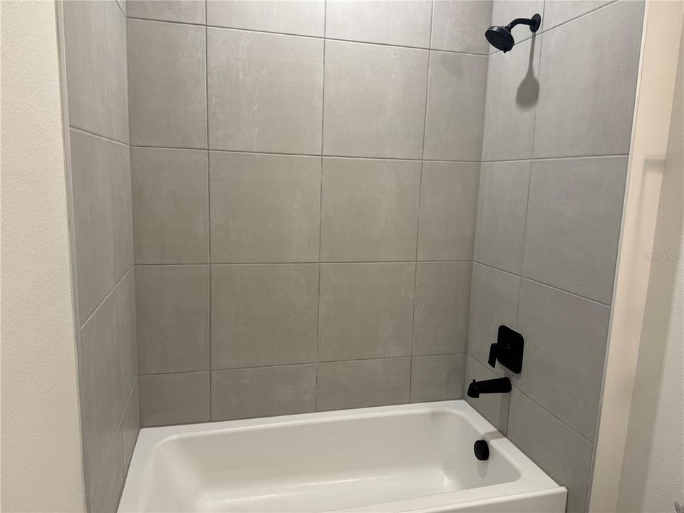 GUEST BATH SOAKING TUB - SHOWER COMBO