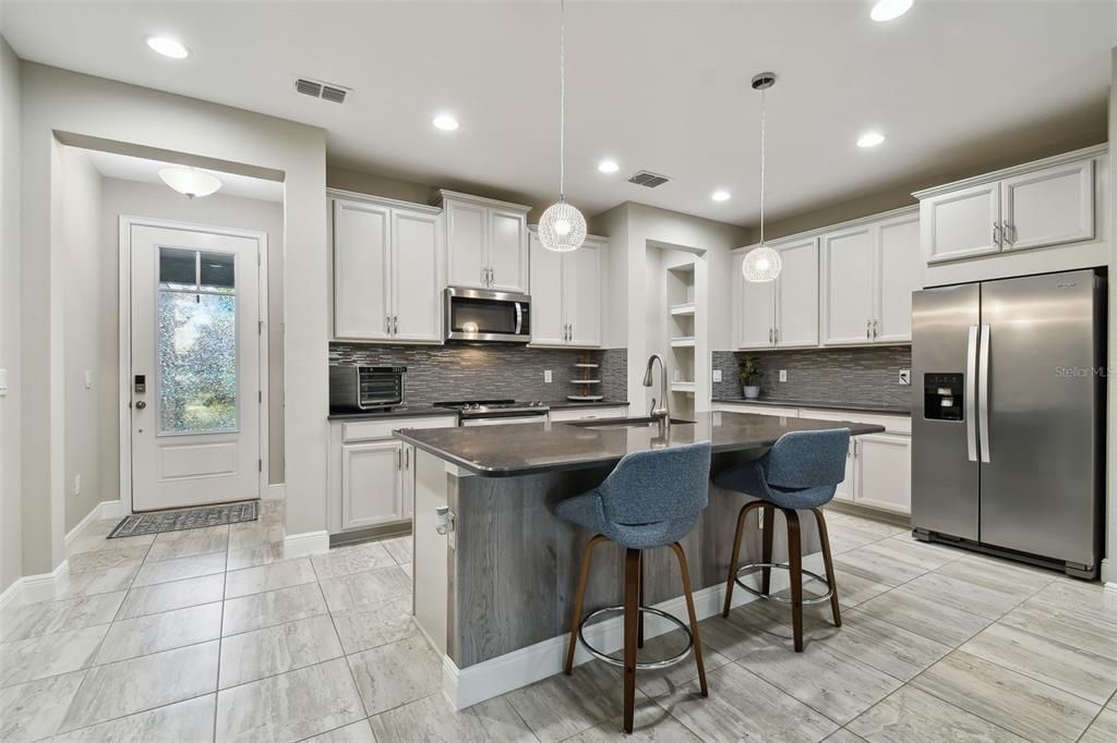 Kitchen with entry door