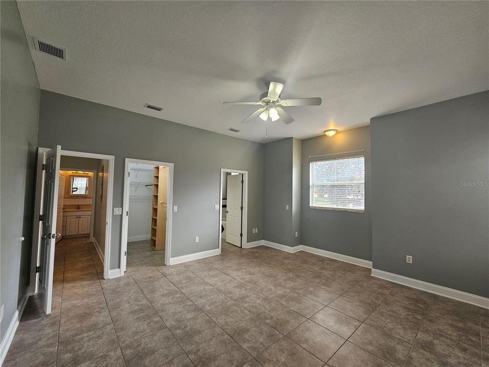 Primary bedroom showing the hall, closet and primary bath