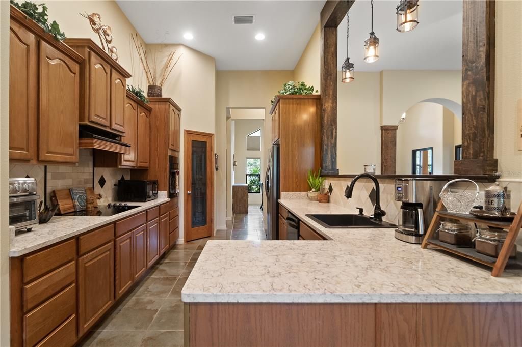 new quartz countertops with solid wood cabinetry