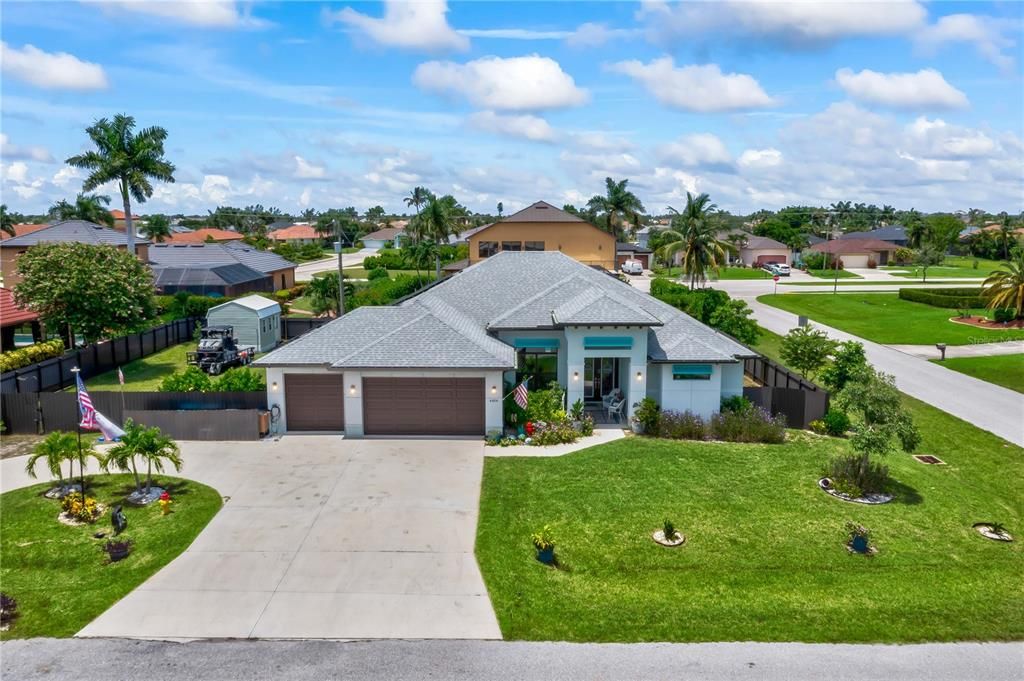 A stately home with full wraparound driveway. Super custom and super beautiful.