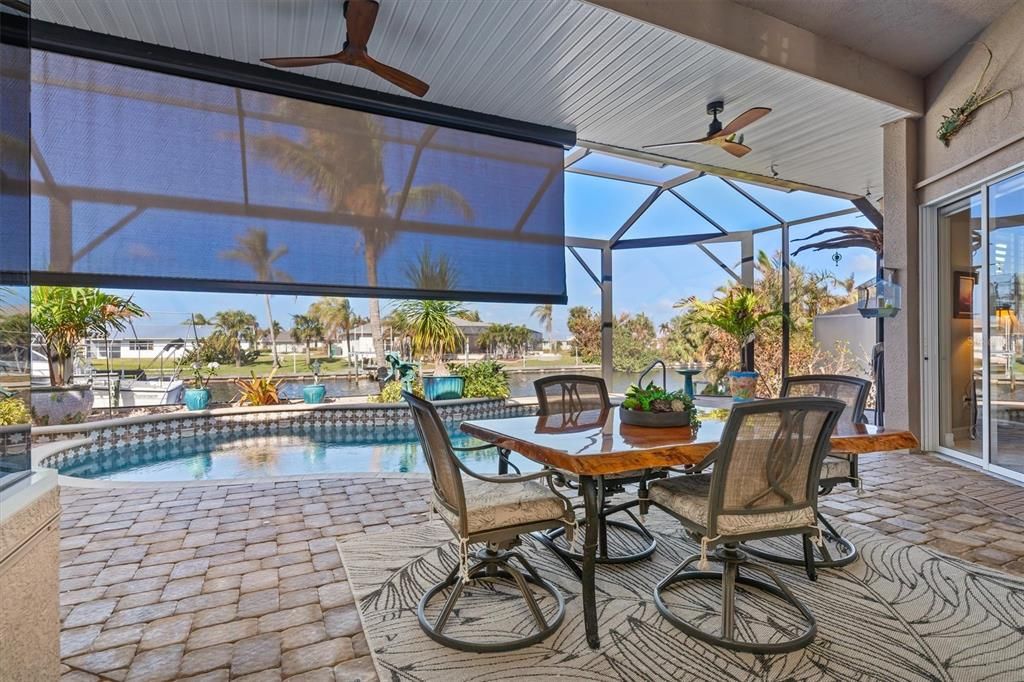 3 ceiling fans with sun shutter to keep out afternoon sun.