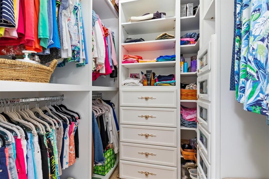 Custom "closets with ceiling fan in "hers"