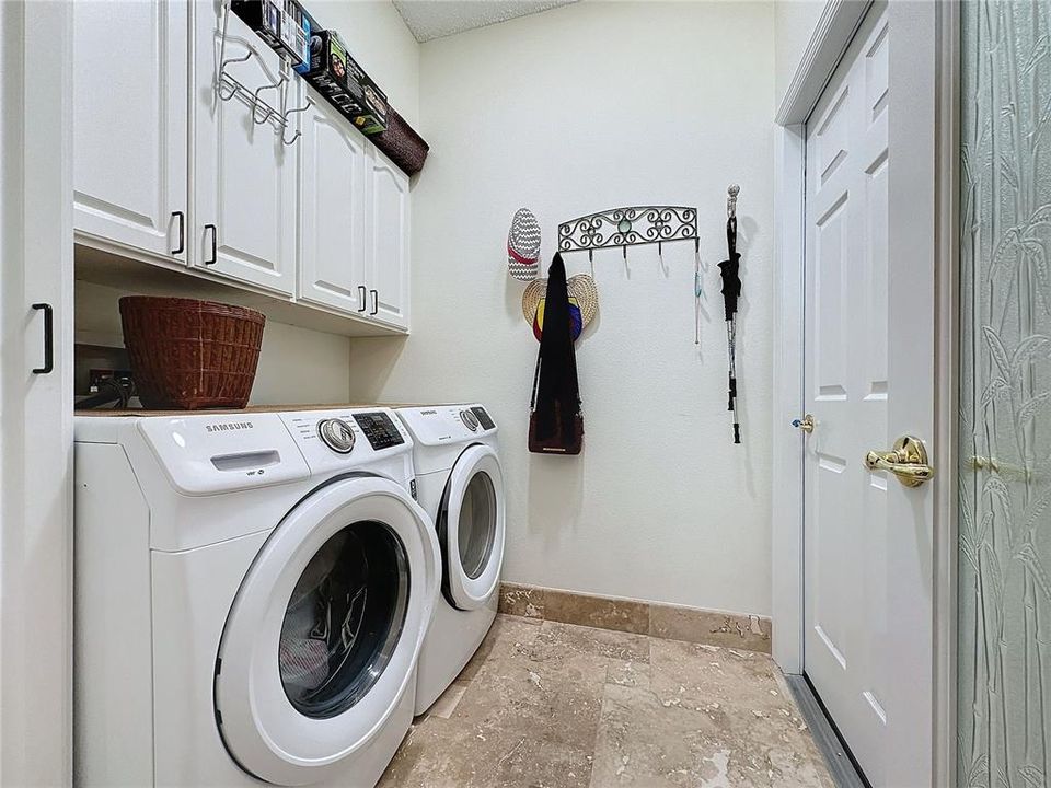 washer & dryer remain- door to garage