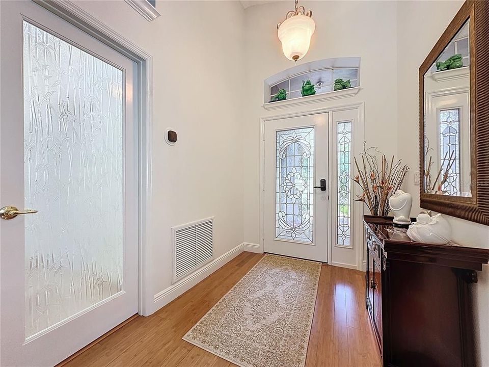 glass door leads to laundry room